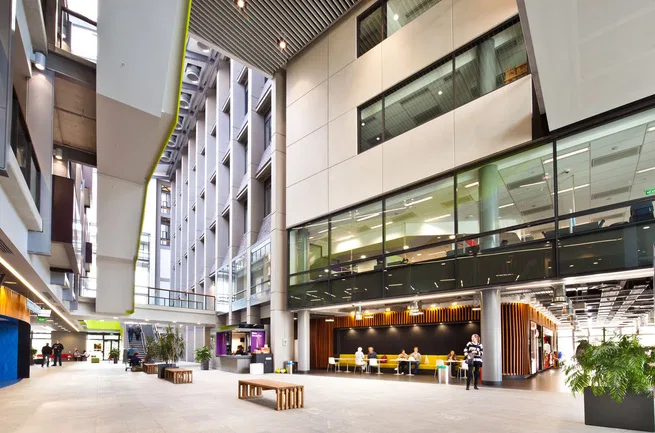 University of auckland grafton campus redevelopment atrium from ground floor photo credit tod wilson